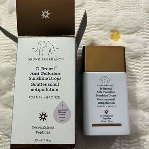 Drunk Elephant D-Bronzi Drops with Cocoa Extract and Peptides.
